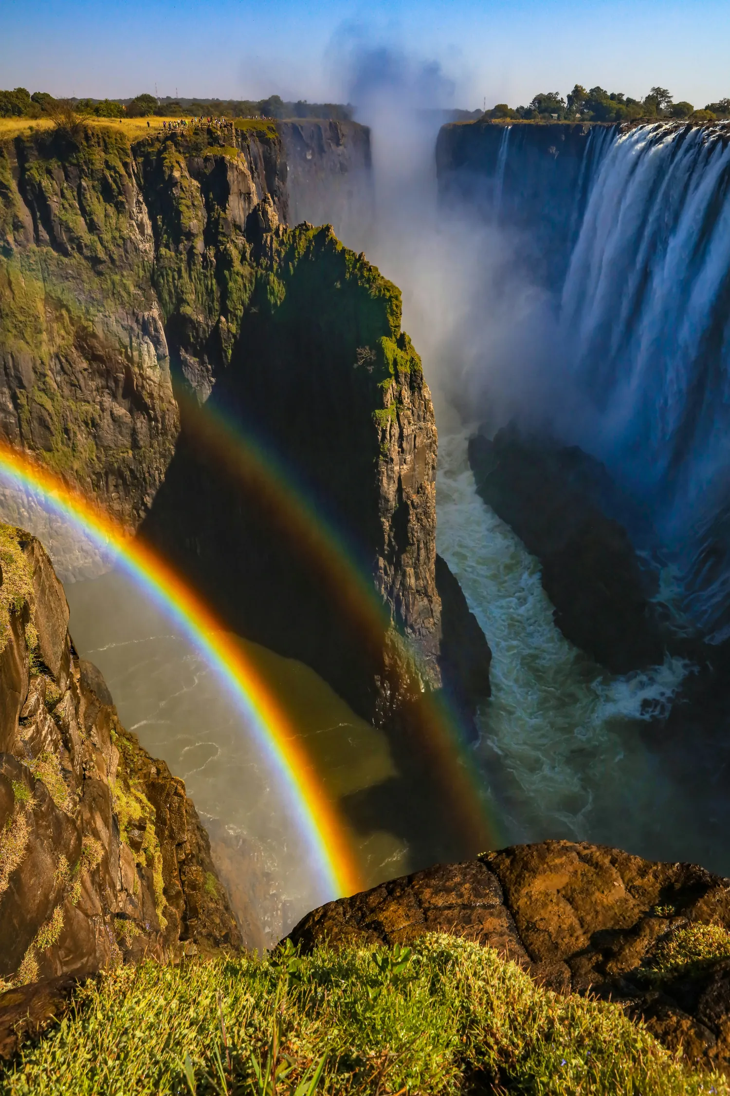 A rainbow over the gorge at Victoria Falls